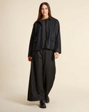 Pantaloni ampi in maglia di lana cotta