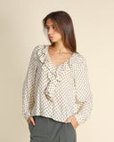 Blusa con volant