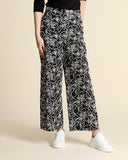 Pantaloni ricamati in cotone e lino