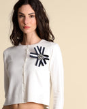 Cardigan with brooch