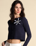 Cardigan with brooch