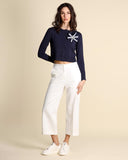 Cardigan with brooch