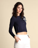 Cardigan with brooch