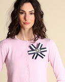 Cardigan con spilla