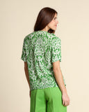 Blusa in fantasia con volant