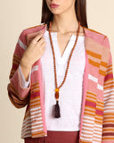 Collana di semi, vetro e resina