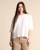Blusa in mussola di cotone goffrato