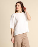 Blusa in mussola di cotone goffrato
