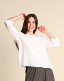 Blusa in mussola di cotone goffrata