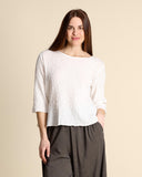 Blusa in mussola di cotone goffrata