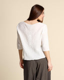 Blusa in mussola di cotone goffrata
