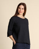 Blusa in mussola di cotone goffrata
