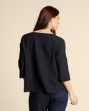 Blusa in mussola di cotone goffrata