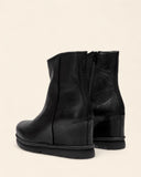 Stivaletti in pelle con zeppa