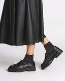 Mocassini con frangia e borchie