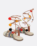 Sandali con perline e pompon