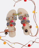 Sandali con perline e pompon